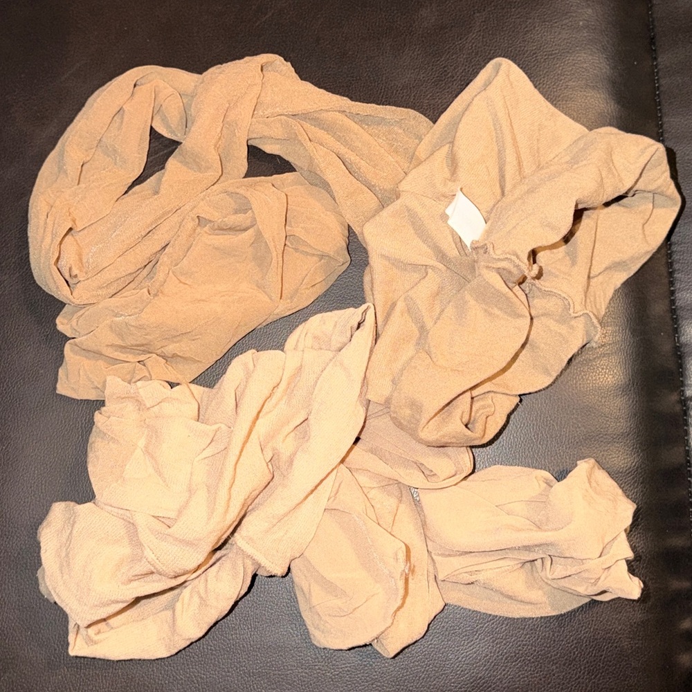 Tan pantyhose with runs